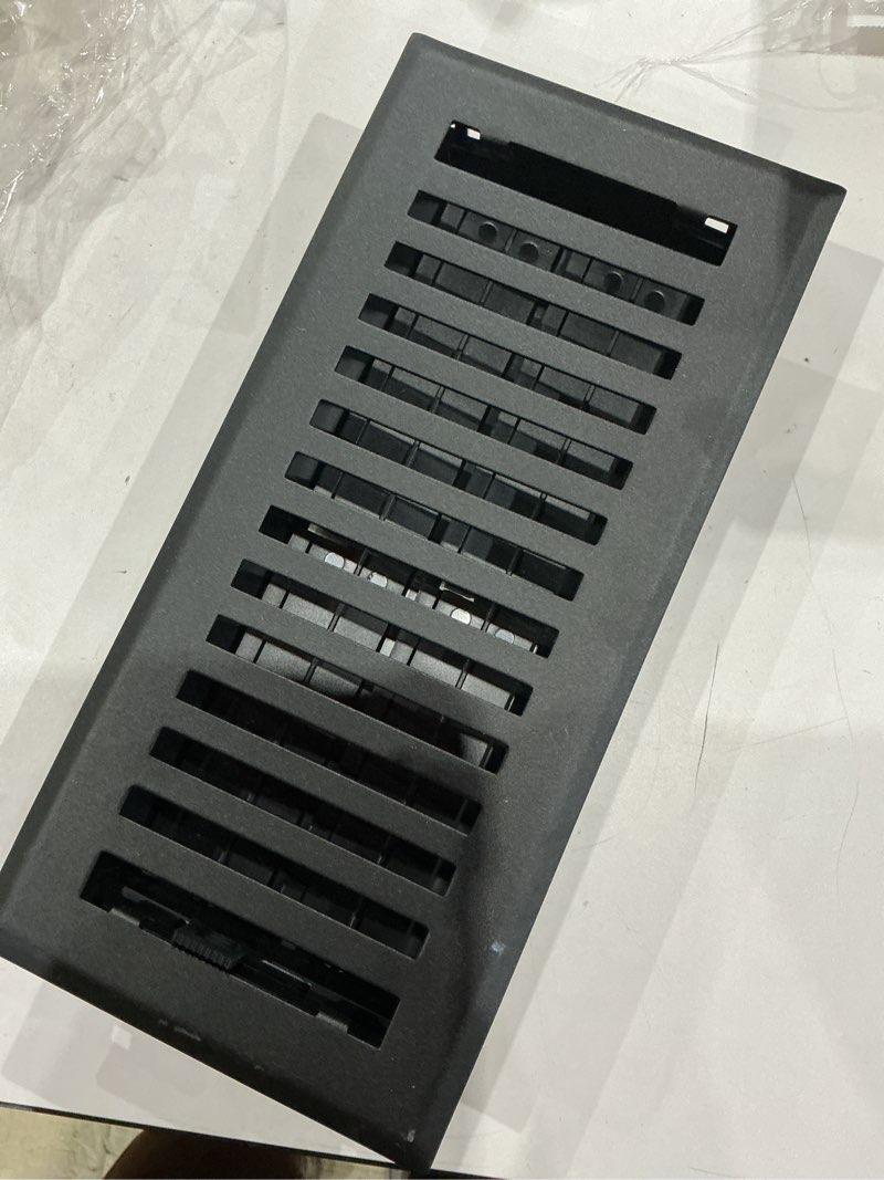 Condition photo showing As Is for allen + roth 4-in x 12-in maximum airflow steel matte black brooklyn design floor register