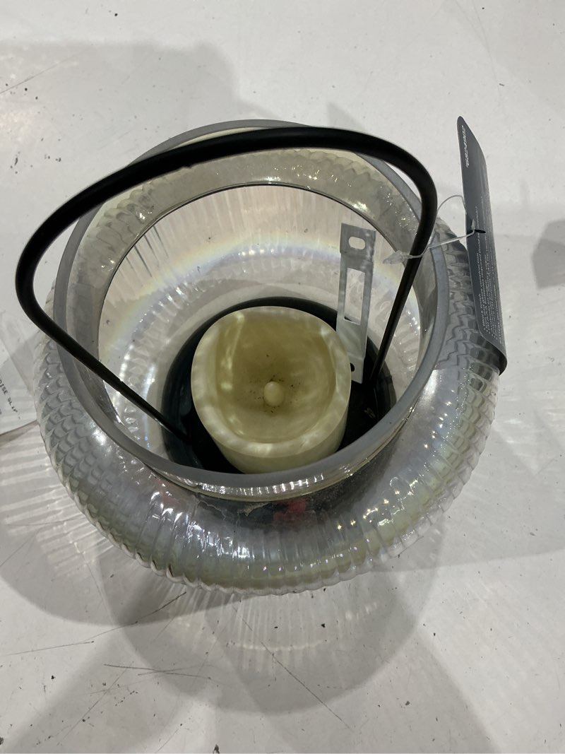 Condition photo showing As Is for style selections 7.28-in x 9.84-in clear glass led light outdoor decorative lantern