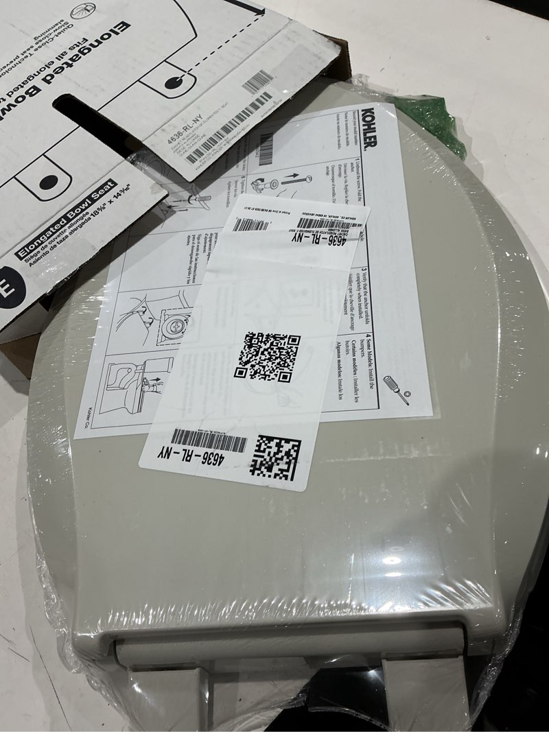 Condition photo showing Good Condition for kohler 4636-rl-ny cachet readylatch elongated toilet seat, quiet-close lid and seat, countoured seat, grip-tight bumpers and installation hardware, dune