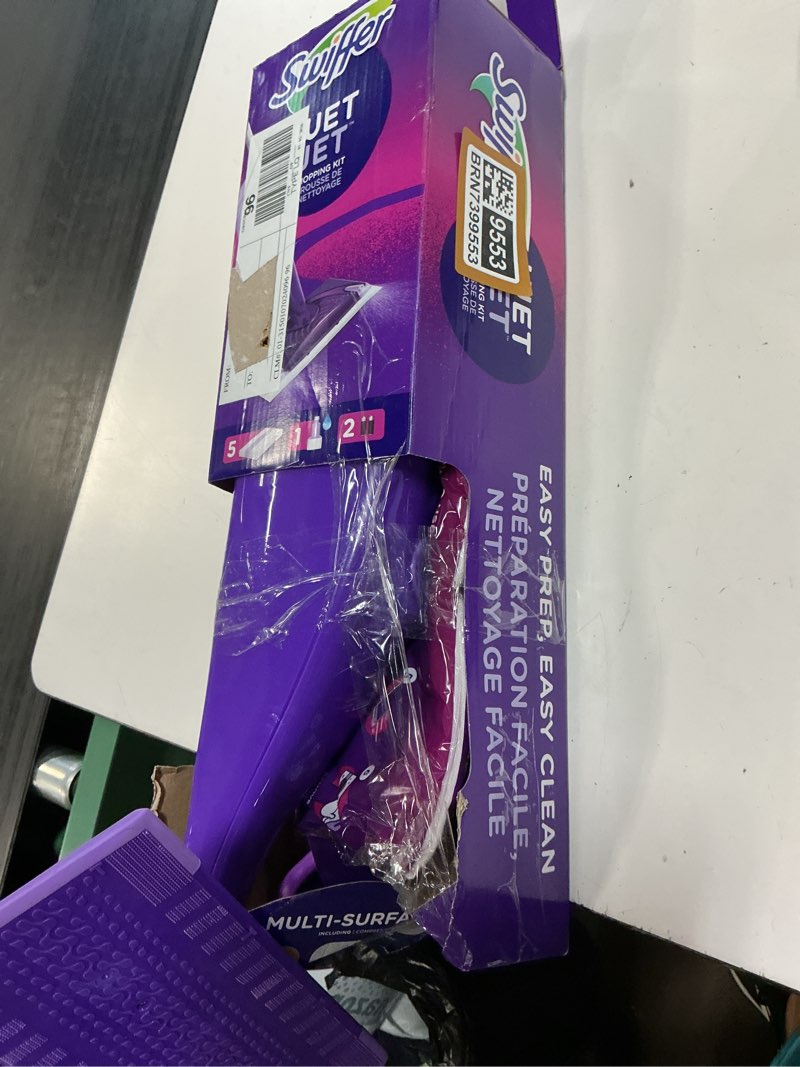 Condition photo showing As Is for swiffer wetjet spray mop starter kit (1-wetjet, 5-pads, cleaning solution and batteries)