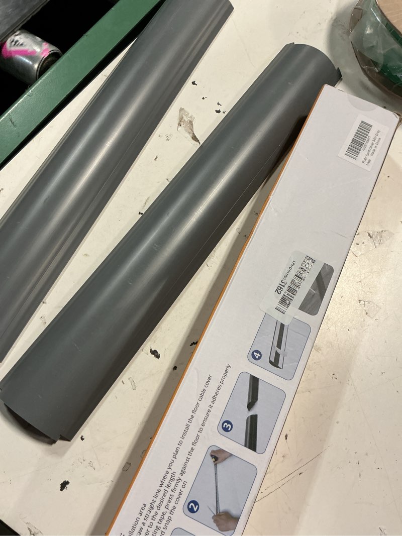Condition photo showing Good Condition for zhiyo 34in cord covers for wires on floor, large capacity wire hider, grey | fits 4-7 cables, rigid pvc construction, 2 pack 17" each, seamless connection, self-adhesive, cord cavity 1.8" w x 0.6" h