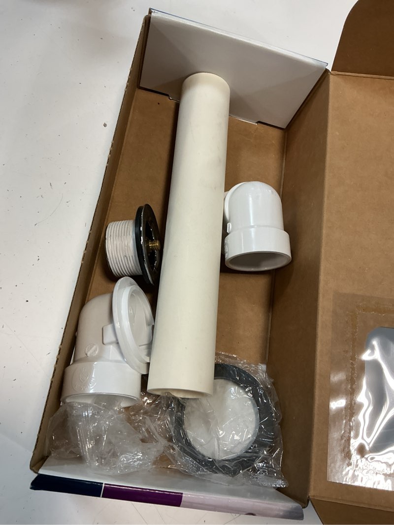 Condition photo showing As Is for dearborn 1-1/2-in polished chrome push n' pull white/polished chrome push-pull drain with pvc pipe included