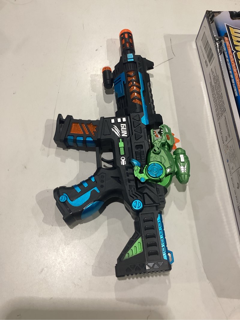 Condition photo showing New/Like New for not tested dinosaur light up toy gun with sound effects, noise-making gun toys for kids indoor/outdoor play & halloween costume, christmas birthday dinosaur gifts for 3 4 5 6 7 year old boys toddlers black-green