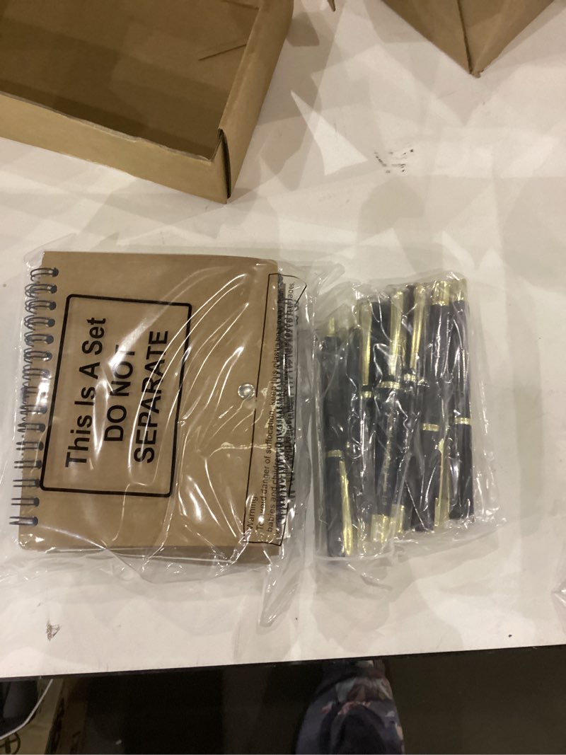10 notebooks/ pens