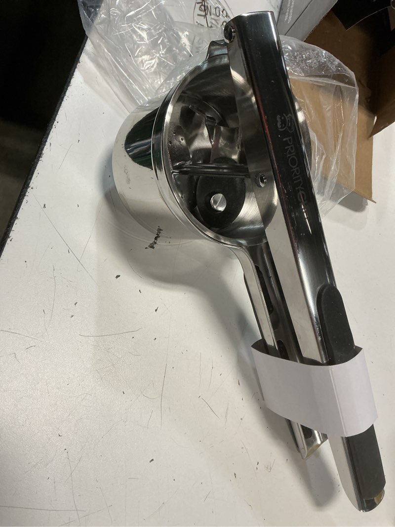 Condition photo showing As Is for prioritychef large 15oz potato ricer, heavy duty stainless steel potato masher and ricer kitchen tool, press and mash kitchen gadget for perfect mashed potatoes - everytime fixed disc black