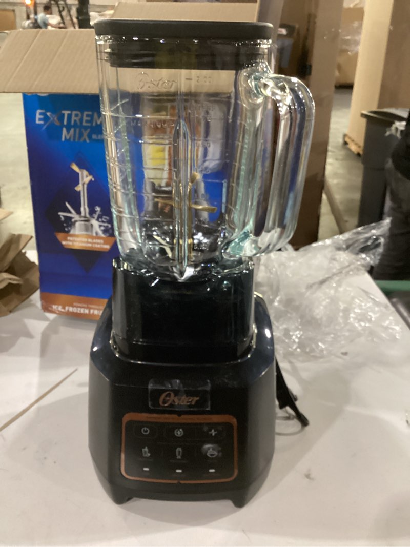 Condition photo showing As Is for not tested ****oster extreme mix blender, 64oz glass jar, 3 iblend preset functions, 1600-watts, 10-point blade stack with titanium coating & 24oz blend-n-go cup 1600 watts glass jar w/ cup