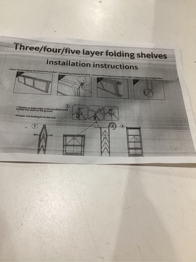 Condition photo showing As Is for three/four/fove layer foldng shelves