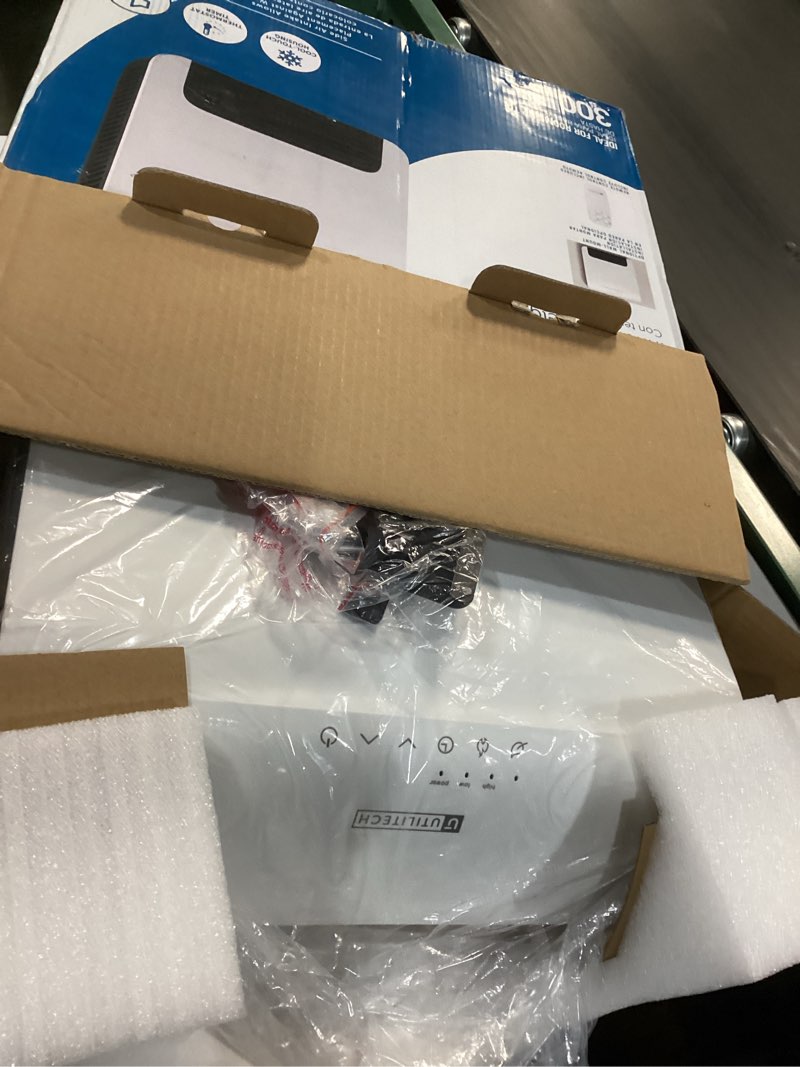 Condition photo showing As Is for Utilitech 1500-Watt 120 -Volt Heater fan Heater ( 14.76-in L x 16.93-in H Grille )