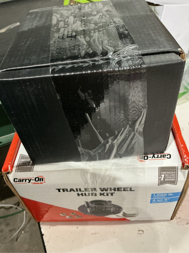 Condition photo showing As Is for carry-on trailer 150t - 4-bolt trailer wheel hub assembly  1 250 lb. 150t