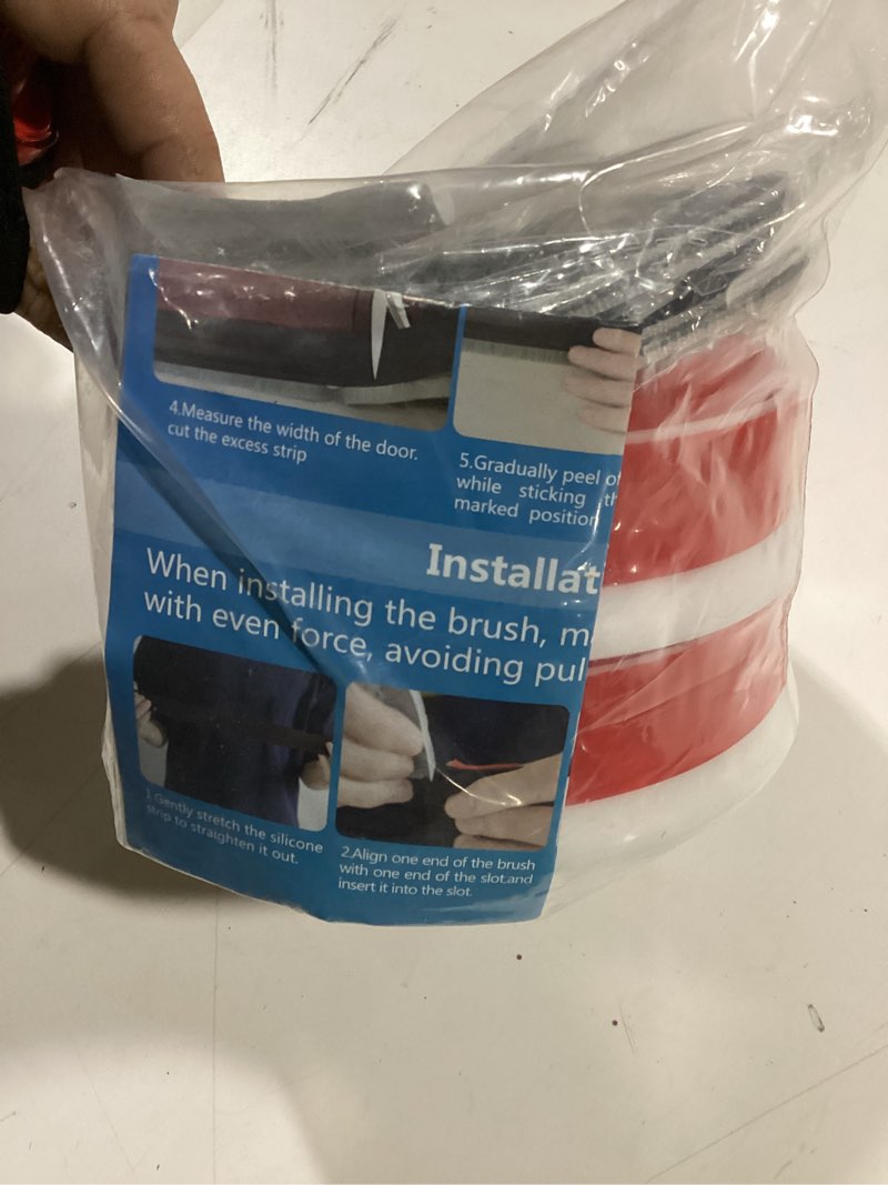 Condition photo showing As Is for Door Draft Stopper with Brush,Silicone Under Door Draft Stopper Reduce Noise,for Exterior & Interior Doors Blocker Dust,39" Black 1Pcs Black