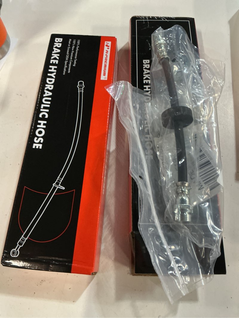 Condition photo showing New/Like New for a-premium rear driver and passenger brake hydraulic hoses compatible with select ford models - focus