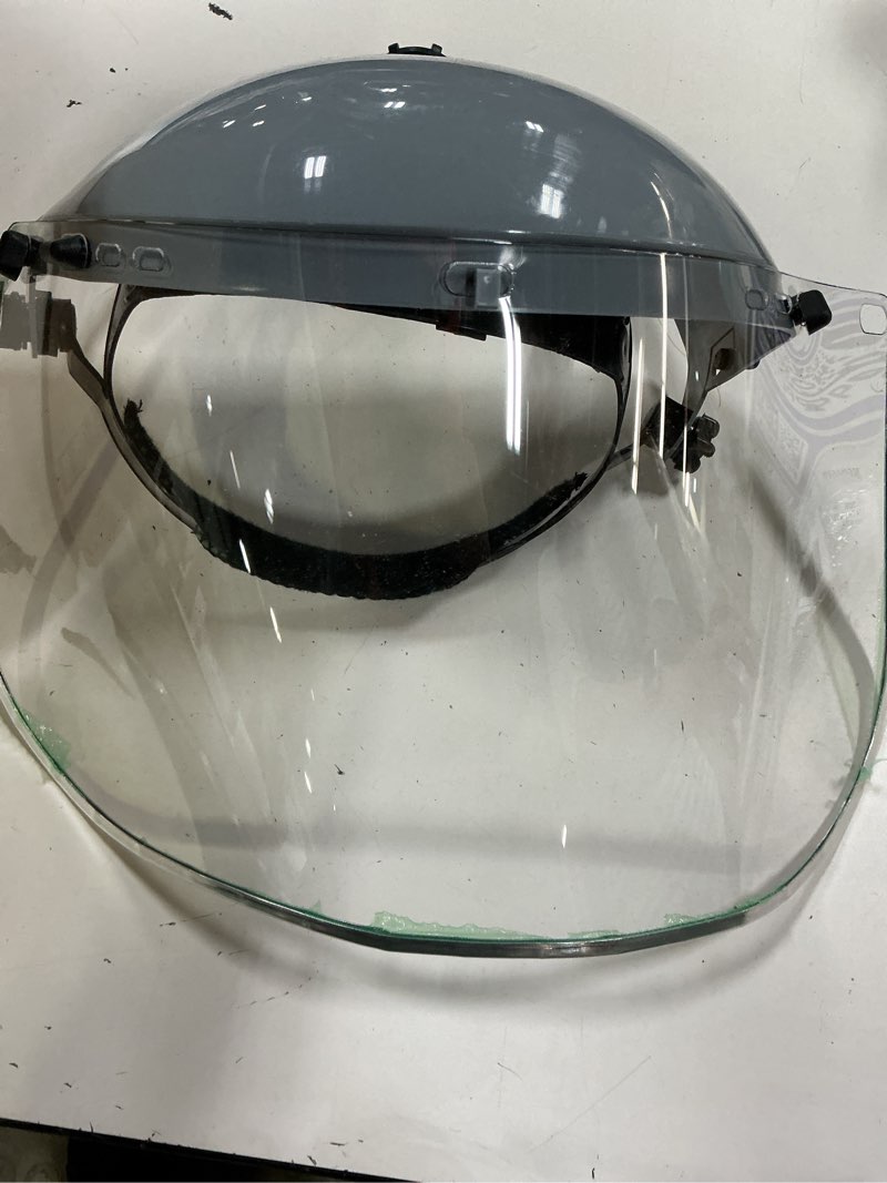 Condition photo showing Good Condition for sellstrom advantage face shield - lightweight mask with crown & ratchet headgear, for work, grinding, cutting - ansi z87.1 - clear uncoated polycarbonate window standard binding