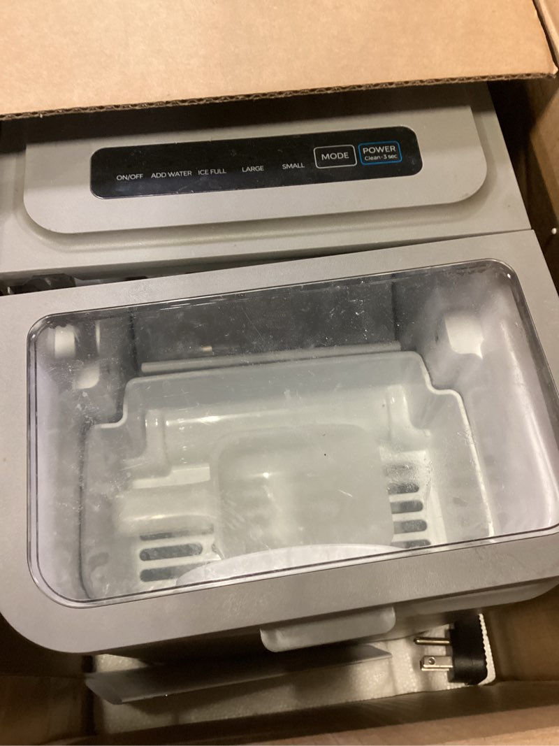 Condition photo showing As Is for midea meri26b1agy countertop bullet-ice maker, 8 ice bullets ready in 6 minutes, 26lbs/24h, self-cleaning function with ice scoop and basket for home/office/rv grey