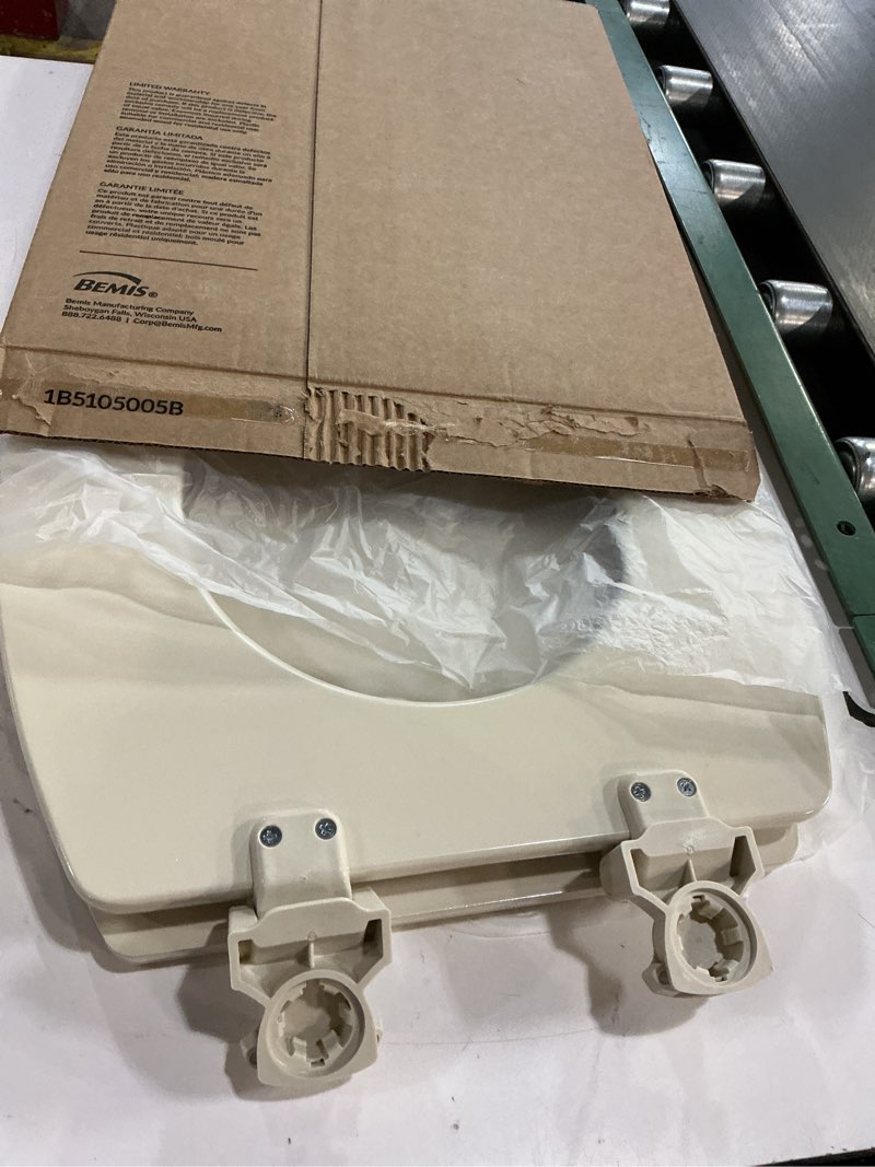 Condition photo showing As Is for Bemis 1500EC 006 Toilet Seat with Easy Clean & Change Hinges, Elongated, Durable Enameled Wood, Bone, 1 Pack