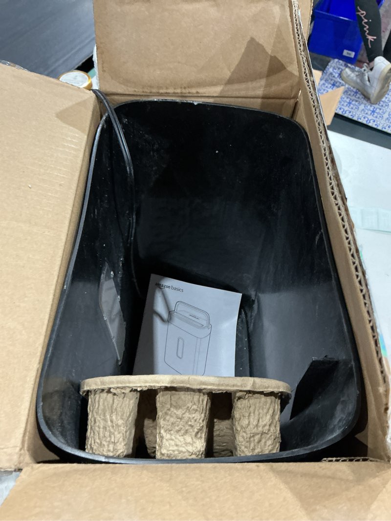 Condition photo showing As Is for amazon basics cross cut paper and credit card shredder, 12 sheet (new model), black 12 sheet black
