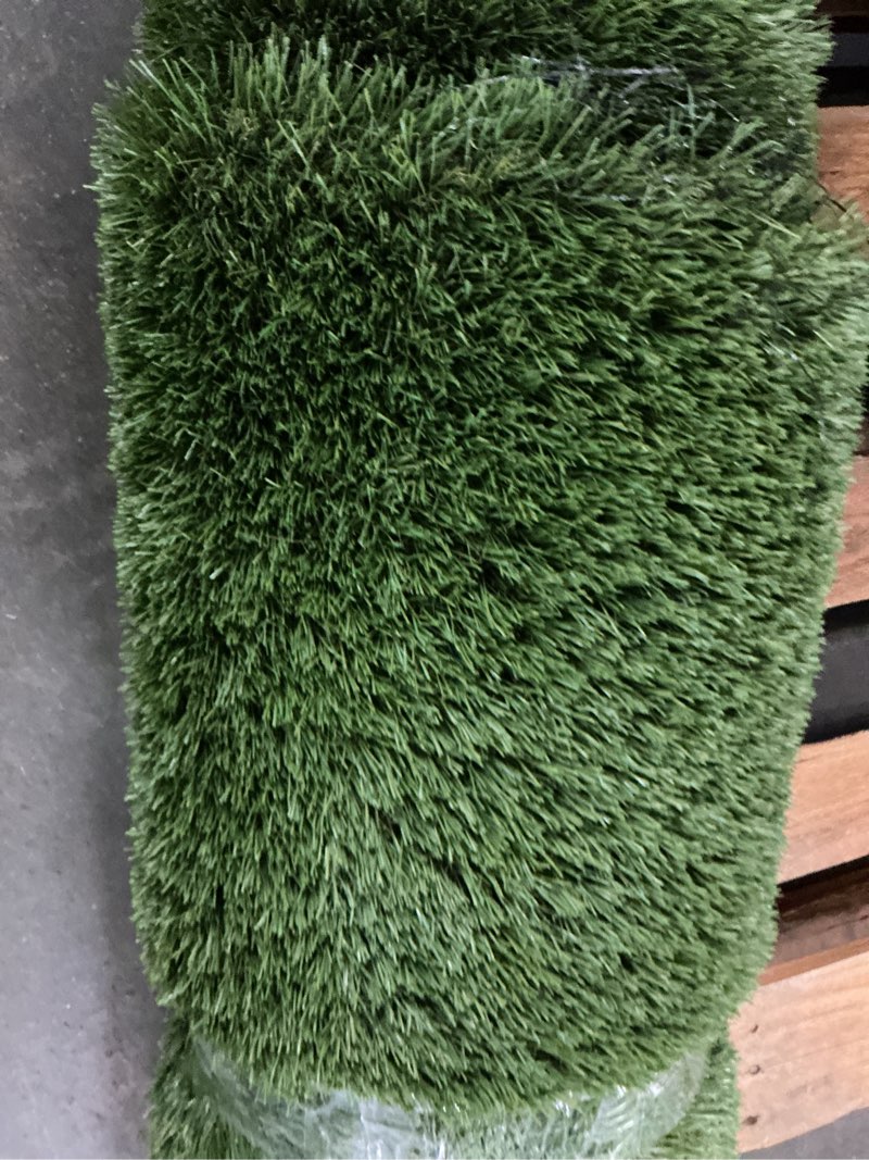 Condition photo showing As Is for select surfaces evergreen artificial grass size: 7.38 ft x 11.68 ft / 2.25 m x 3.56 m