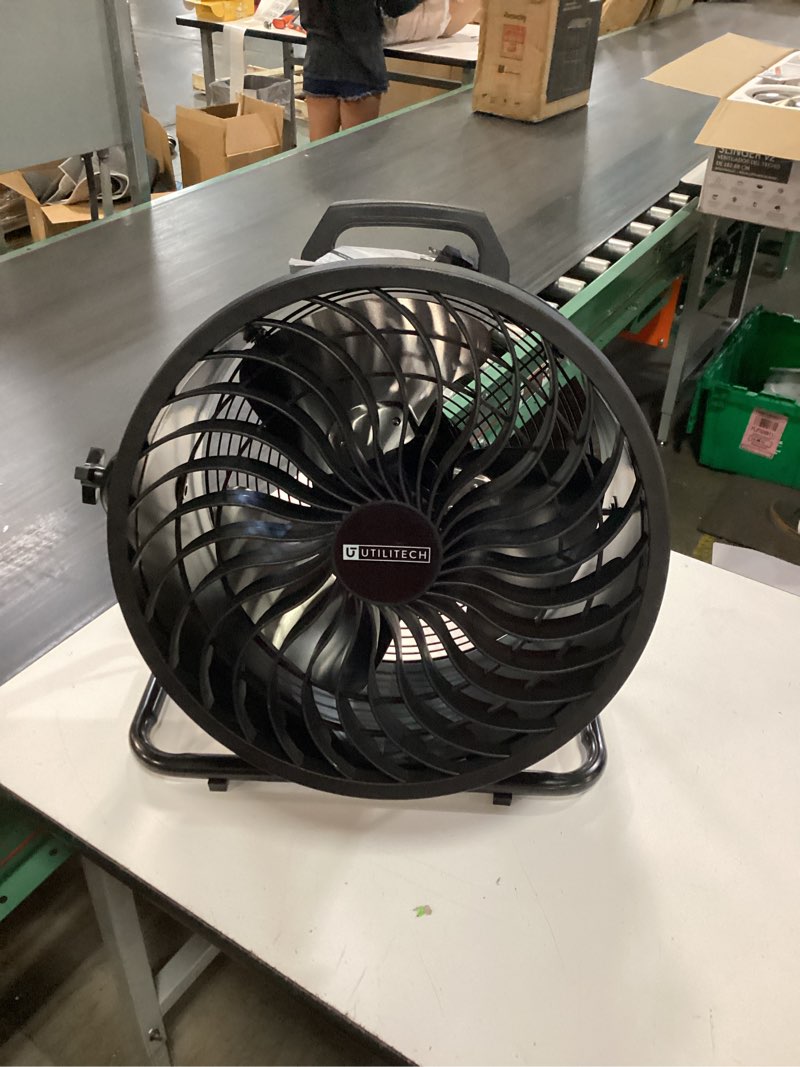 Condition photo showing As Is for utilitech 16-inch high-velocity indoor floor fan, model lfd5-t400, designed with a black all-metal construction.