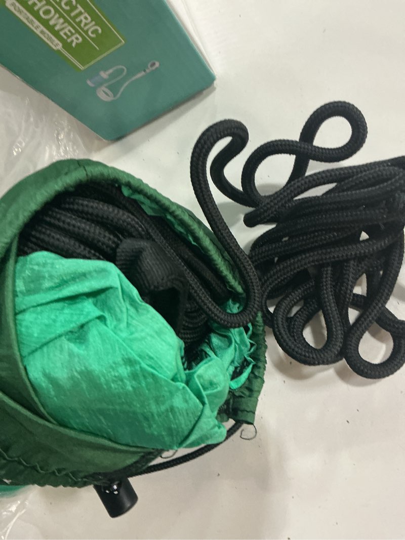 Condition photo showing New/Like New for double hammock by bear butt dark green / light green