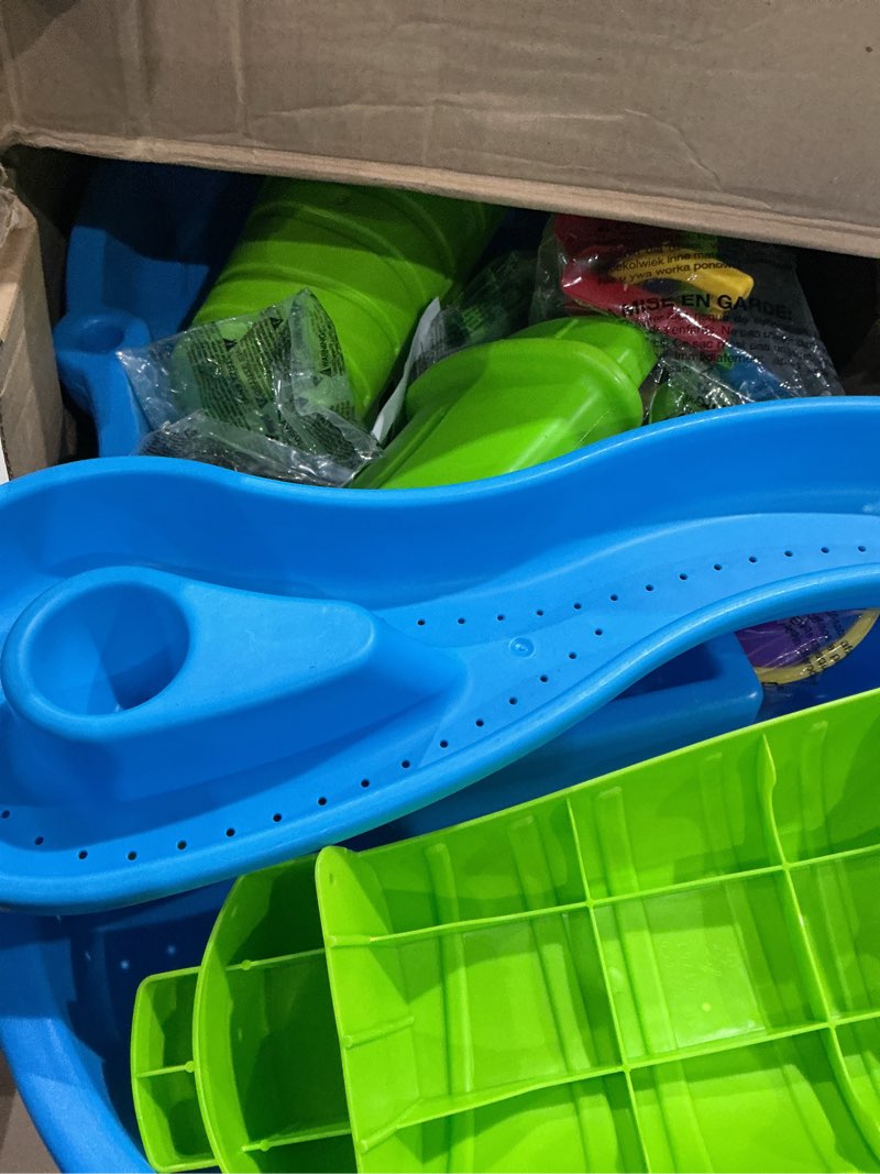 Condition photo showing As Is for step2 rain showers splash pond water table, kids water and sand activity sensory playset, summer outdoor toys, 13 piece water toy accessories, for toddlers 1.5+ years old, blue & green