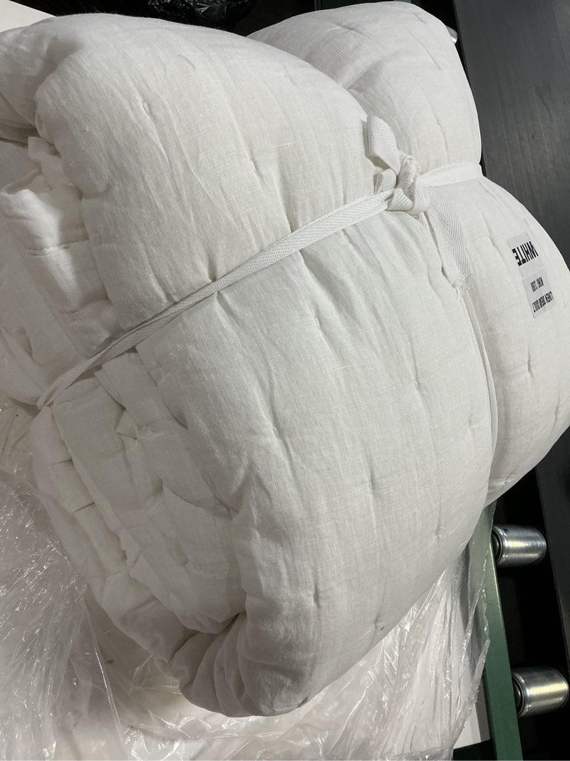 Condition photo showing As Is for (king, color white)european linen dream quilt(quince)
