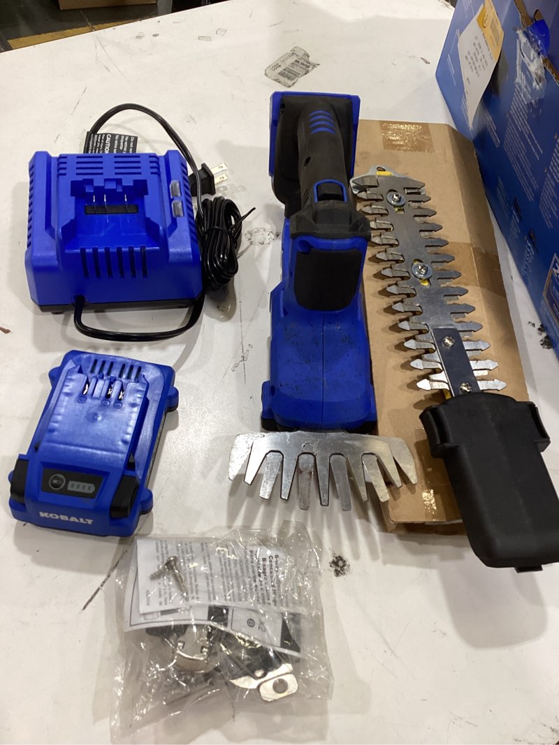 Condition photo showing As Is for kobalt 24-volt 8-in battery hedge trimmer 2 ah (battery and charger included)