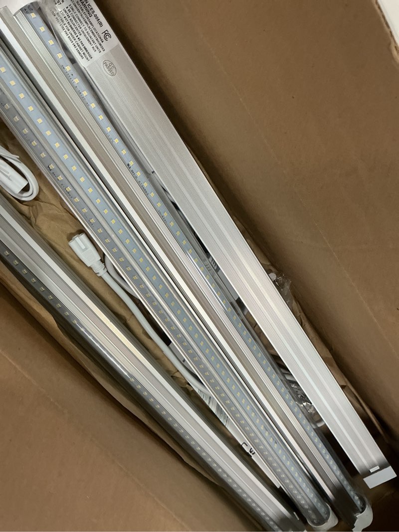 Condition photo showing Good Condition for SHOPLED LED Shop Lights 2FT, 20W 2600LM 5000K Daylight, V-Shaped Utility Shop Lights, T8 Linkable Ceiling Light Fixtures, 2 Foot Tube Light for Workbench, Basement, Cabinet, ETL Listed, 4-Pack 2FT-4 Count