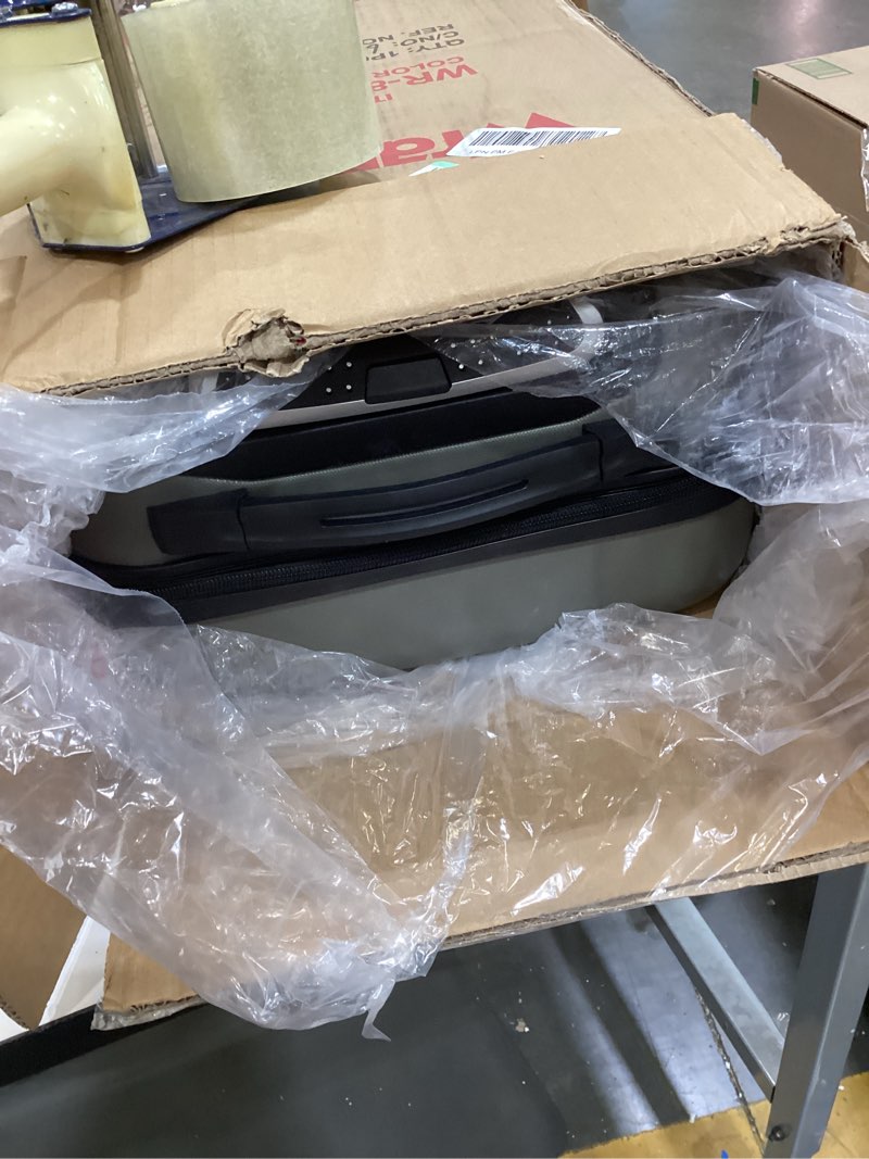 Condition photo showing Good Condition for wrangler 22" hardside spinner carry-on luggage, olive