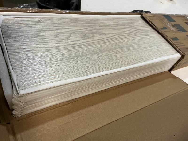 Condition photo showing Good Condition for Art3d 36-Pack Peel and Stick Luxury Vinyl Flooring Tiles, 54 Sq. Ft Self Adhesive Wood Plank for Kitchen, Bedroom, Bathroom, Grey Ash 36 x 6 x 0.1 inches Grey Ash 36