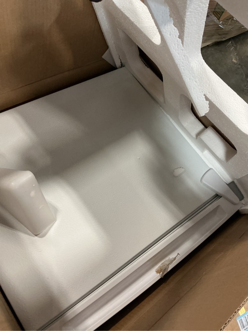 Condition photo showing Good Condition for frigidaire retro compact fridge with chiller, countertop, built-in bottle opener, compact refrigerator 1.6 cu ft, mini fridge for office, bedroom, dorm room or cabin - 16" d x 18" w x 18.5" h (white)