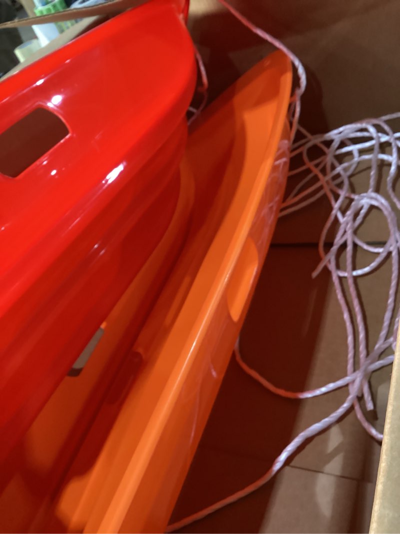 Condition photo showing Good Condition for Red and orange snow sled