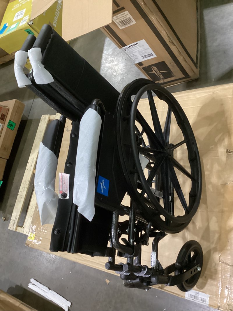 Condition photo showing Good Condition for medline comfortable folding wheelchair with swing-back, desk-length arms and elevating footrests, 18”w x 16”d seat,black 18" wide