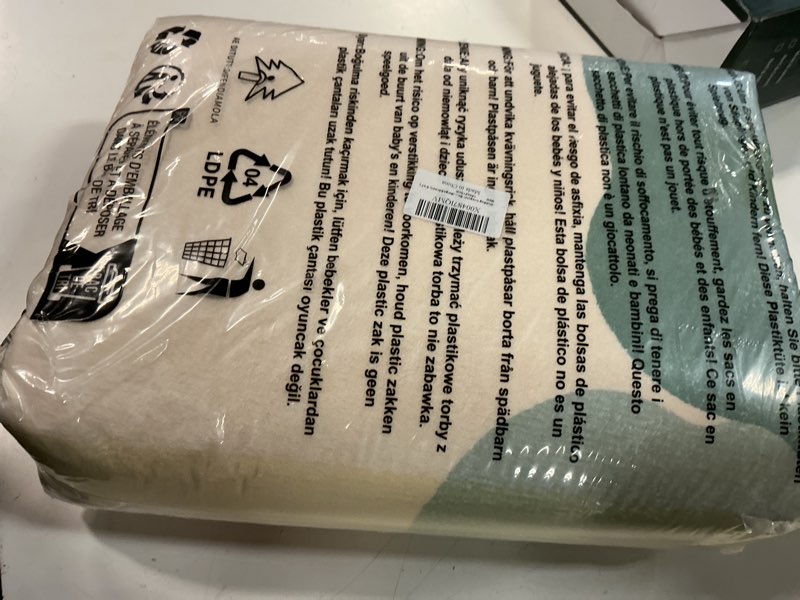 Condition photo showing New/Like New for irregular green floral area rug, washable, non slip rubber backing, soft indoor floor carpet for living room, bedroom, kids room, dining room, entryway(beige&green, 5'x7') 5' x 7' (rectangular) beige&green