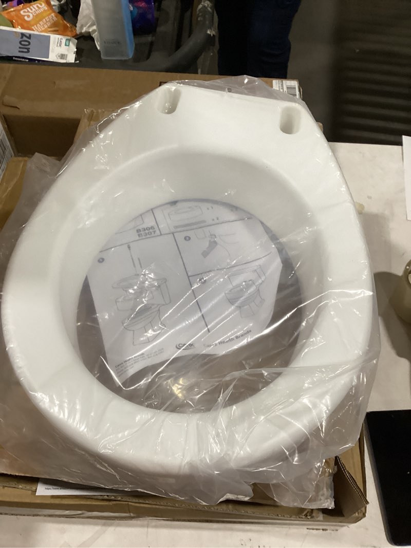 Condition photo showing New/Like New for Carex Toilet Seat Riser, Round Raised Toilet Seat Adds 3.5 inches to Toilet Height, for Assistance Bending or Sitting, 300 Pound Weight Capacity Toilet Riser