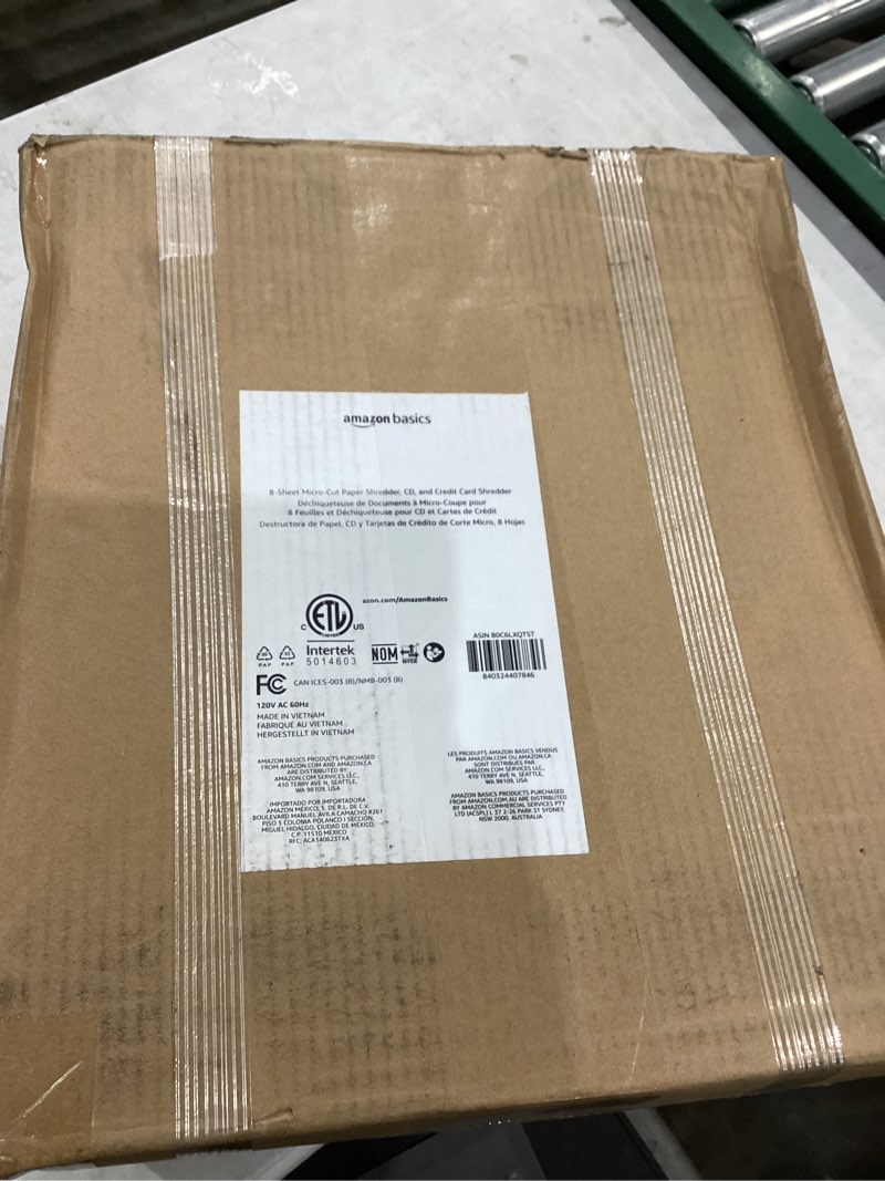 Condition photo showing New/Like New for amazon basics micro cut paper shredder, cd, and credit card shredder, 8 sheet (new model), black