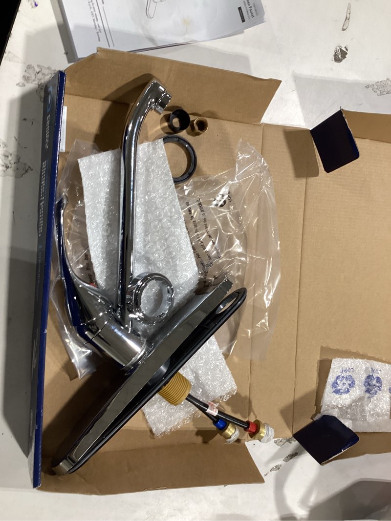 Condition photo showing As Is for project source wakebridge polished chrome single handle deck-mount kitchen faucet (includes deck plate)