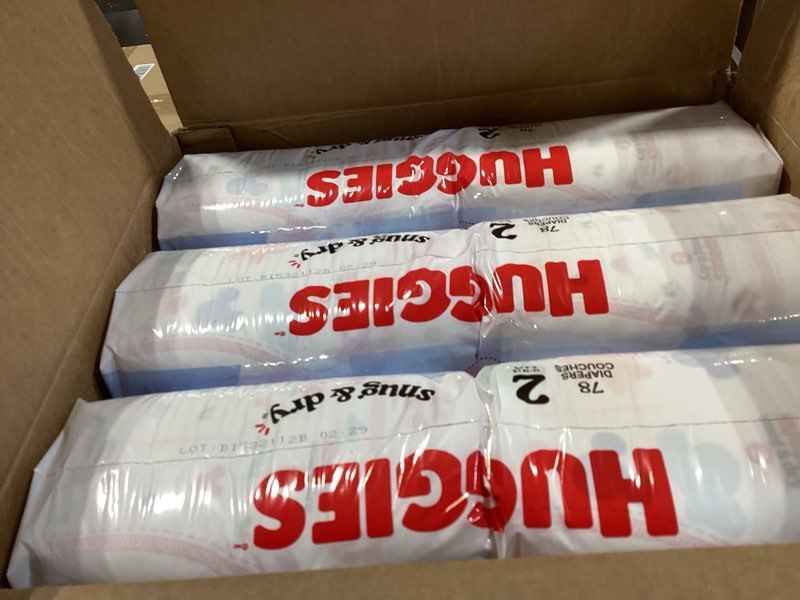 Condition photo showing New/Like New for Huggies Size 2 Diapers, Snug & Dry Baby Diapers, Size 2 (12-18 lbs), 234 Count (3 Packs of 78), Packaging May Vary Size 2 234