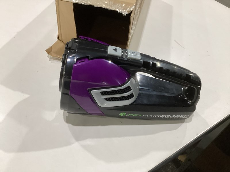 Condition photo showing As Is for bissell pet hair eraser cordless hand vacuum, lithium ion, home, auto, and pet vacuum, easy-empty dirt bin, upholstery tool, brush tool, and crevice tool included, 2390a, not tested, incomplete
