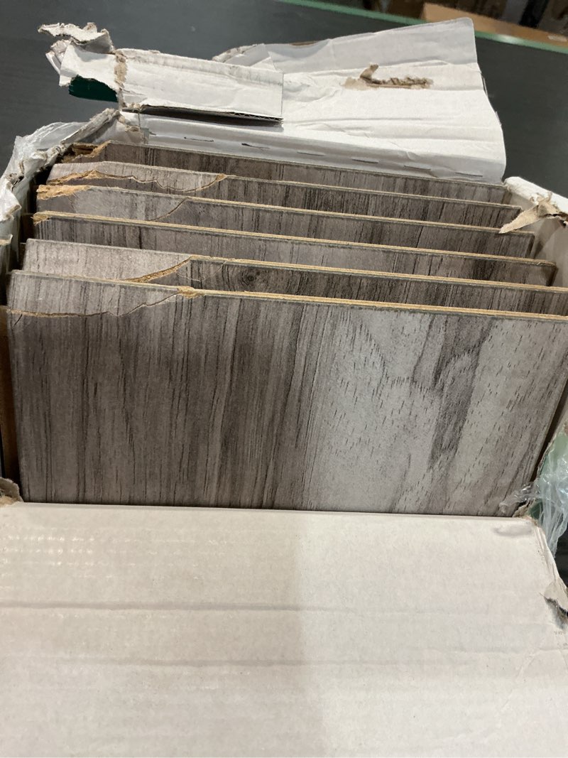 Condition photo showing As Is for select surfaces southern gray spill defense laminate flooring