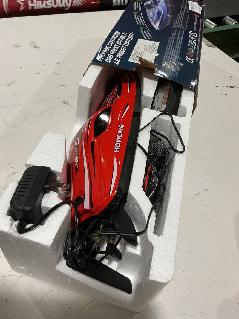 Condition photo showing As Is for bezgar rc boat, 12 inch remote control boat for kids and adults, 25 kph fast rc speed boats with 700mah battery, ideal waterproof toy boats for lakes & pools - tx126 red