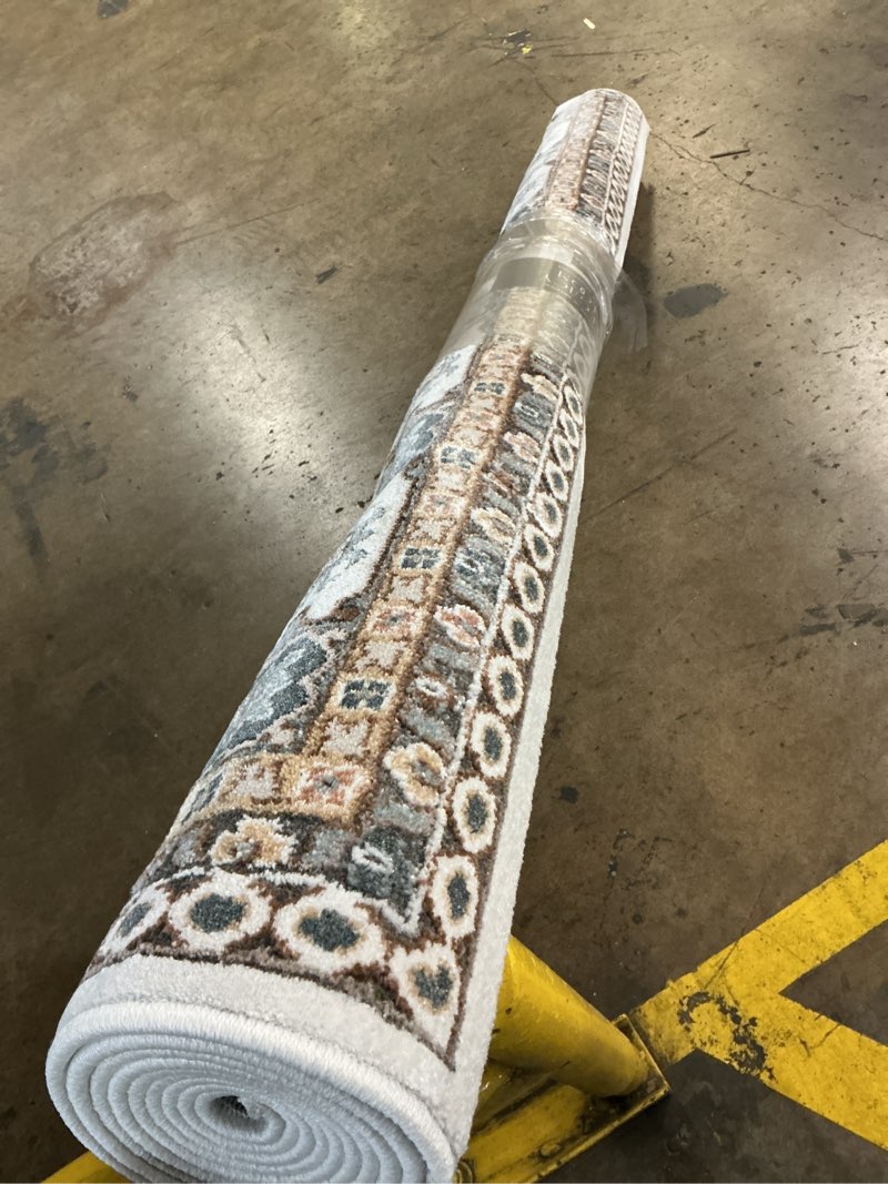 Condition photo showing New/Like New for legacy loom area rug 6'6"x9'6"