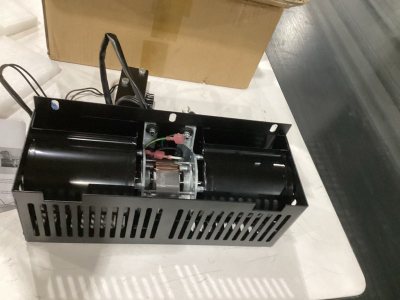 Condition photo showing As Is for wood stove rear fan 2