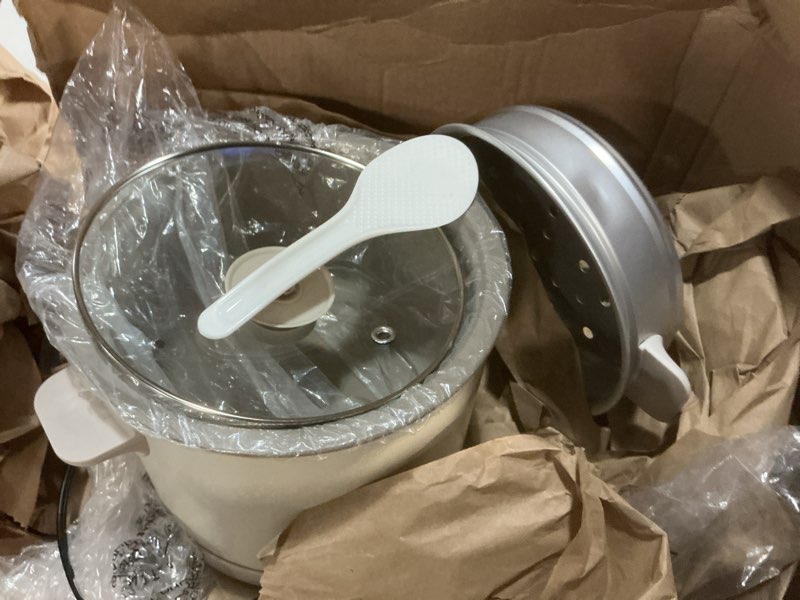Condition photo showing As Is for bella 16 Cup Rice Cooker with Steamer, Dishwasher Safe Steaming Basket, Rice Paddle and Measuring Cup, Removable Nonstick Cooking Bowl, Automatic Keep Warm Function?, 400 Watt, Oatmilk