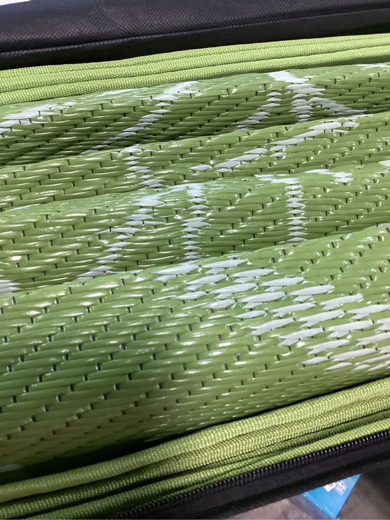 Condition photo showing Good Condition for falflor outdoor rug waterproof 6x9 ft, reversible outdoor plastic straw rug, large outdoor carpet patio rug for rv camping, indoor outdoor rug mat for porch deck backyard balcony picnic beach 6' x 9' grass green
