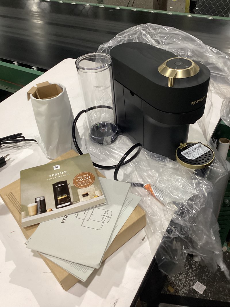 Condition photo showing New/Like New for nespresso vertuo pop+ deluxe coffee and espresso maker by breville with milk frother, matte black gold machine + milk frother matte black gold