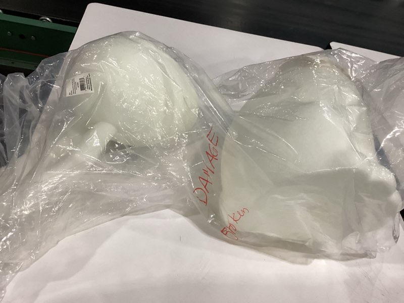 Condition photo showing As Is for *damaged* white decor easter bunny 