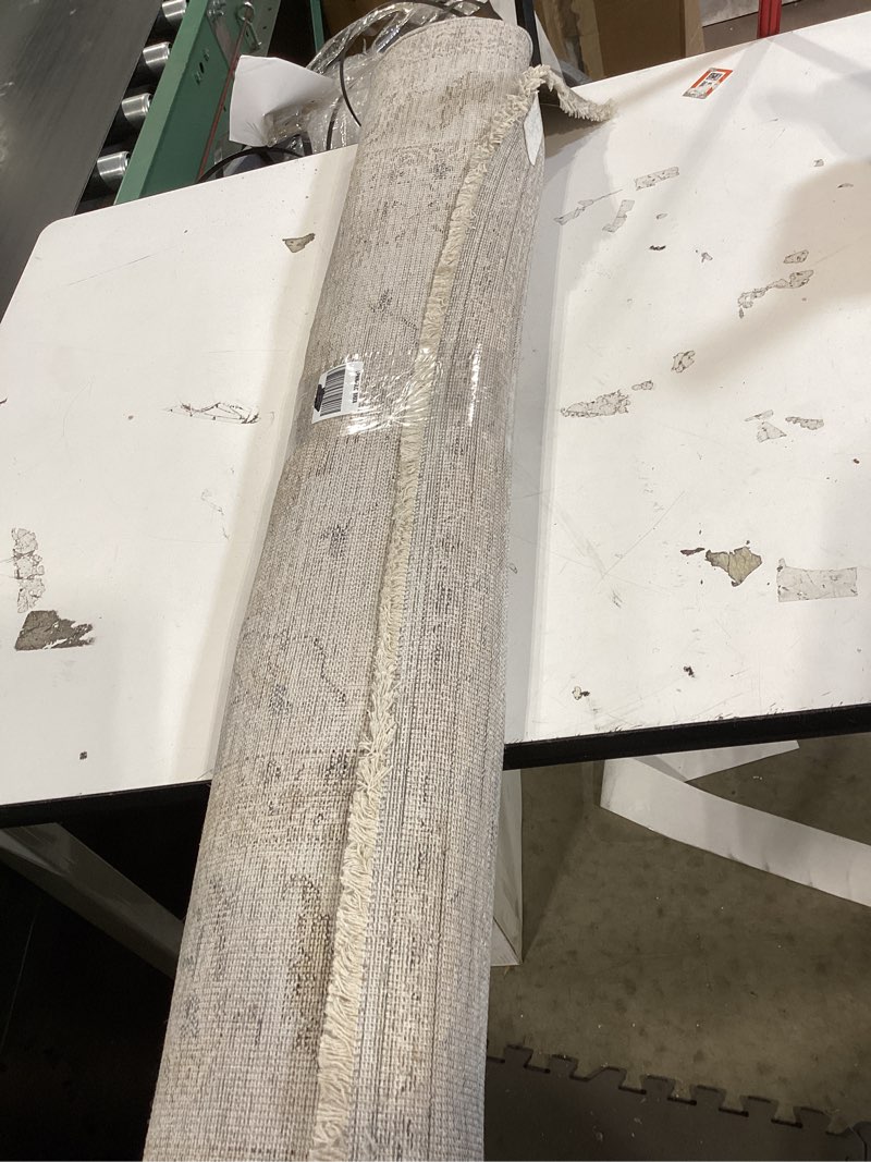 Condition photo showing As Is for loloi magnolia home by joanna gaines millie collection mie-02 sky/gold 3'-6" x 5'-6", .25" pile height, accent rug sky / gold 3'6" x 5'6" (rectangular)