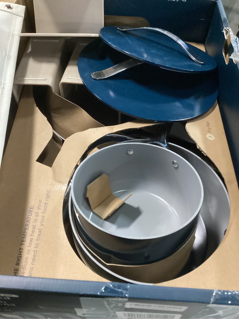 Condition photo showing As Is for Caraway Non-stick Ceramic Cookware Set (12 Piece) Pots, Pans, Lids and Kitchen Storage - PFAS & PFOA Free - Oven Safe Pan Set & Compatible with All Stovetops - Navy Navy 12pc Set
