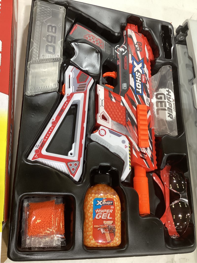 Condition photo showing As Is for xshot hyper gel trace fire blaster, outdoor, (10,000 hyper gel pellets) by zuru, ages 14+