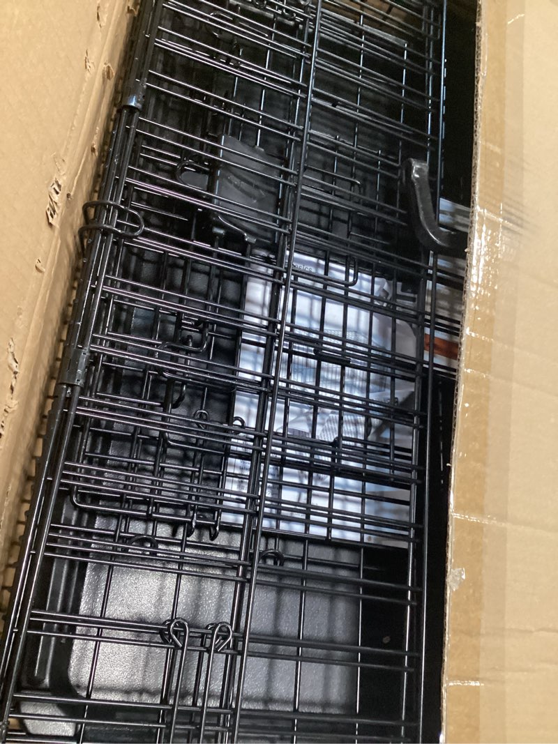 Condition photo showing New/Like New for Amazon Basics Durable, Foldable Metal Wire Small Dog Crate with Tray, Single Door, 24 x 18 x 20 in, Black 24 x 18 x 20 in Single Door w/ Divider