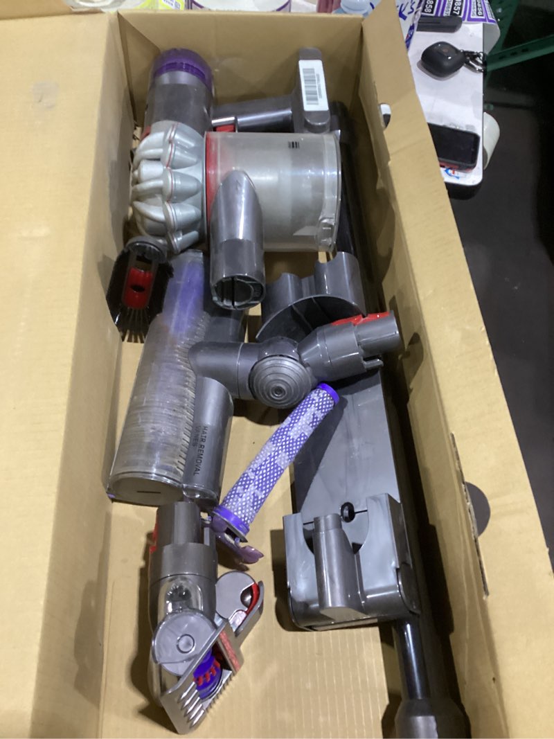 Condition photo showing As Is for dyson v8 plus cordless vacuum, cleans hard floors and carpets, detangles, converts to handheld, 115aw, 2 power modes, up to 40 minutes¹